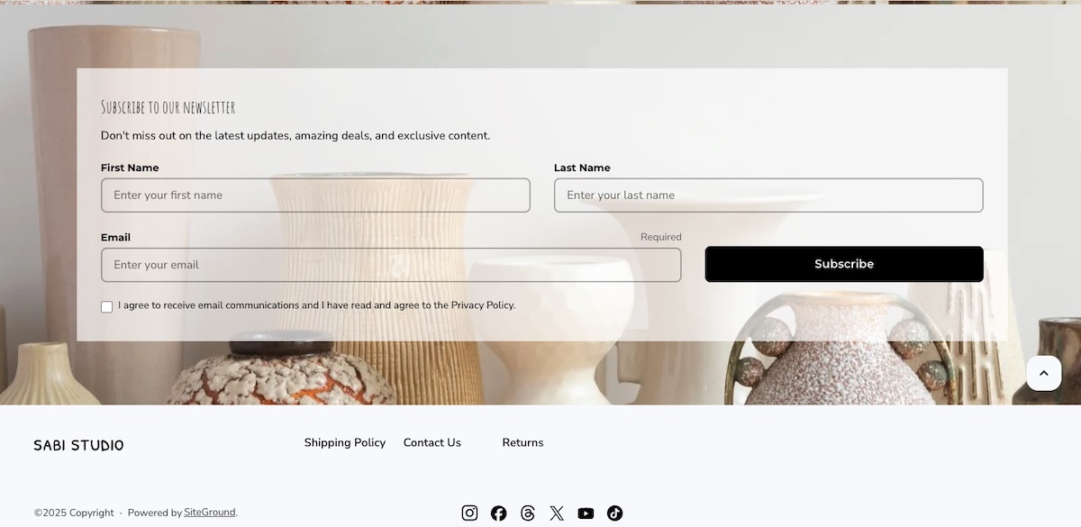Example website with a shipping policy in the footer transmitting trust